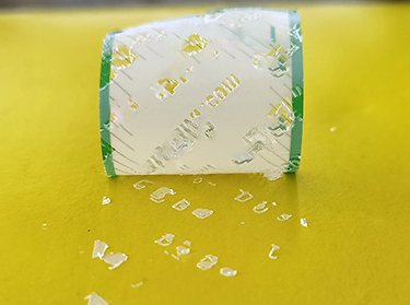 hologram sticker with customized reveal pattern on flat surface