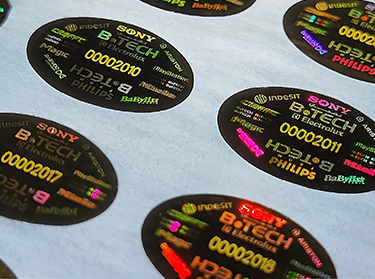 hologram sticker with demetallized numbering reflects the color printed on the bottom