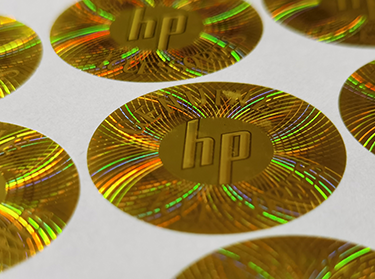 HP hologram sticker with guilloche pattern