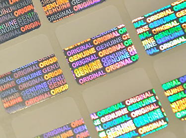 Paper label with generic hologram hot stamping