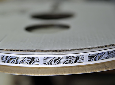 scratch-off coating in roll form