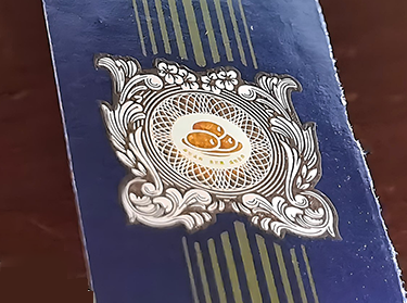 Red optical variable ink printing on logo