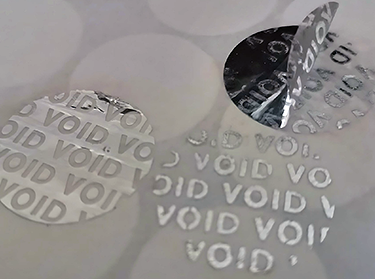 Hologram sticker with VOID reveal pattern